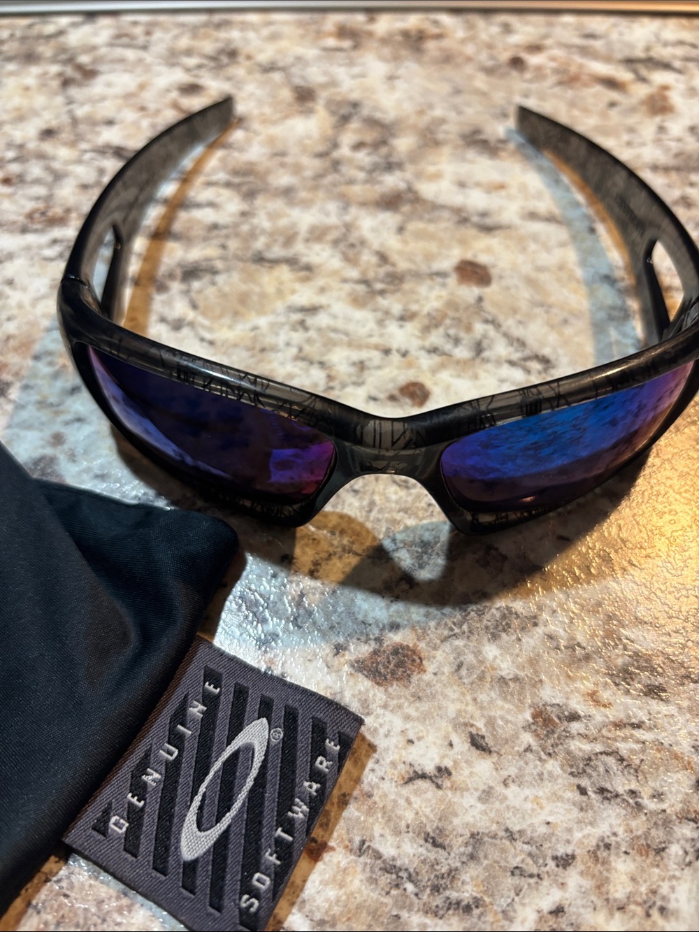 Oakley Men’s Black Frame Purple-Blue Mirrored Sunglasses